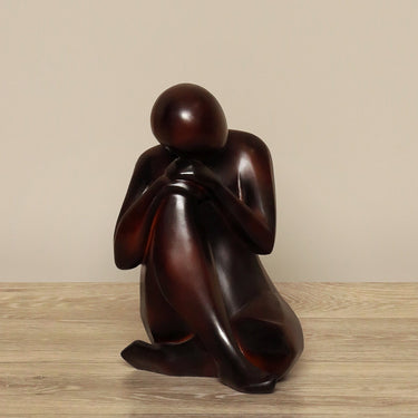 '-Sitting Statue-Bloomr